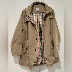 Beige tan hooded raincoat with tan plaid lining